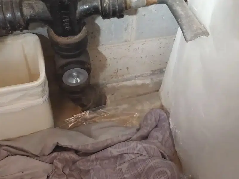 Corroded cast iron drain pipe section with heavy interior buildup for signs your stanton home hasst iron drain problems in Stanton shown from a different service angle