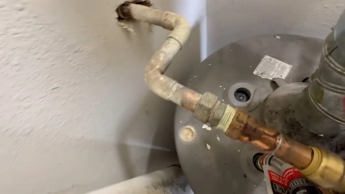 Corroded water heater nipple leaking from the top of the tank for how long do water heaters last orange county in Stanton