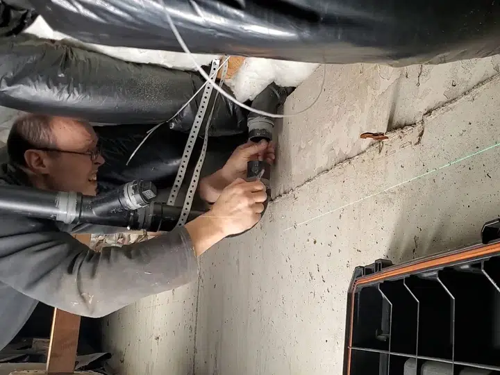 Drain cleaning equipment and line access point for sewer line replacement in Stanton