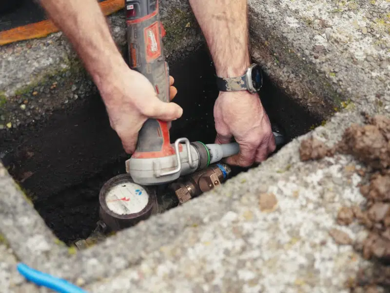 Outdoor water line repair inside ground access box for huntington beach in Huntington Beach