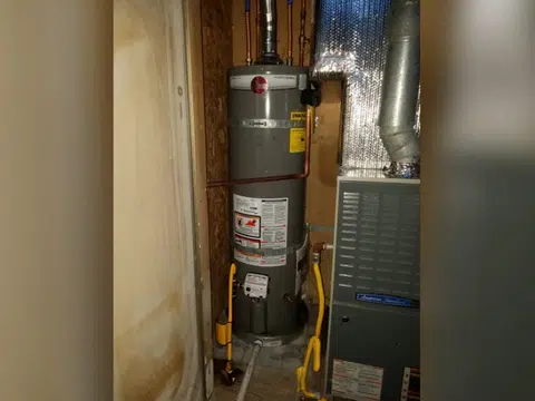 Water heater in utility closet with nearby furnace for plumbing blog index in Stanton