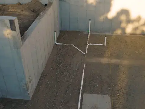 Plumbing repair work area with exposed pipe and tools for index in Stanton for thumb svc backflow testing prevention 001