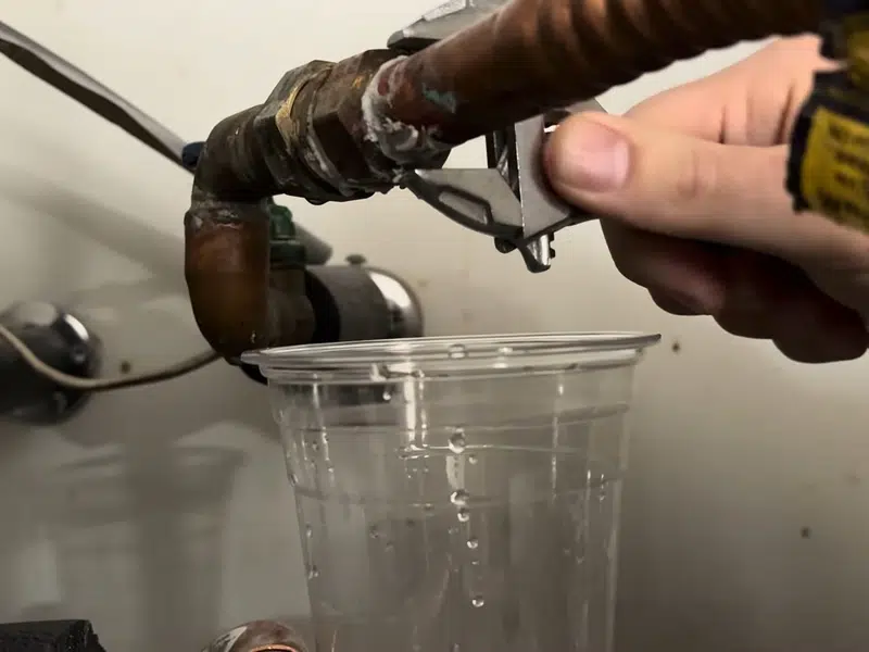 Plumbing repair work area with exposed pipe and tools for los alamitos in Los Alamitos